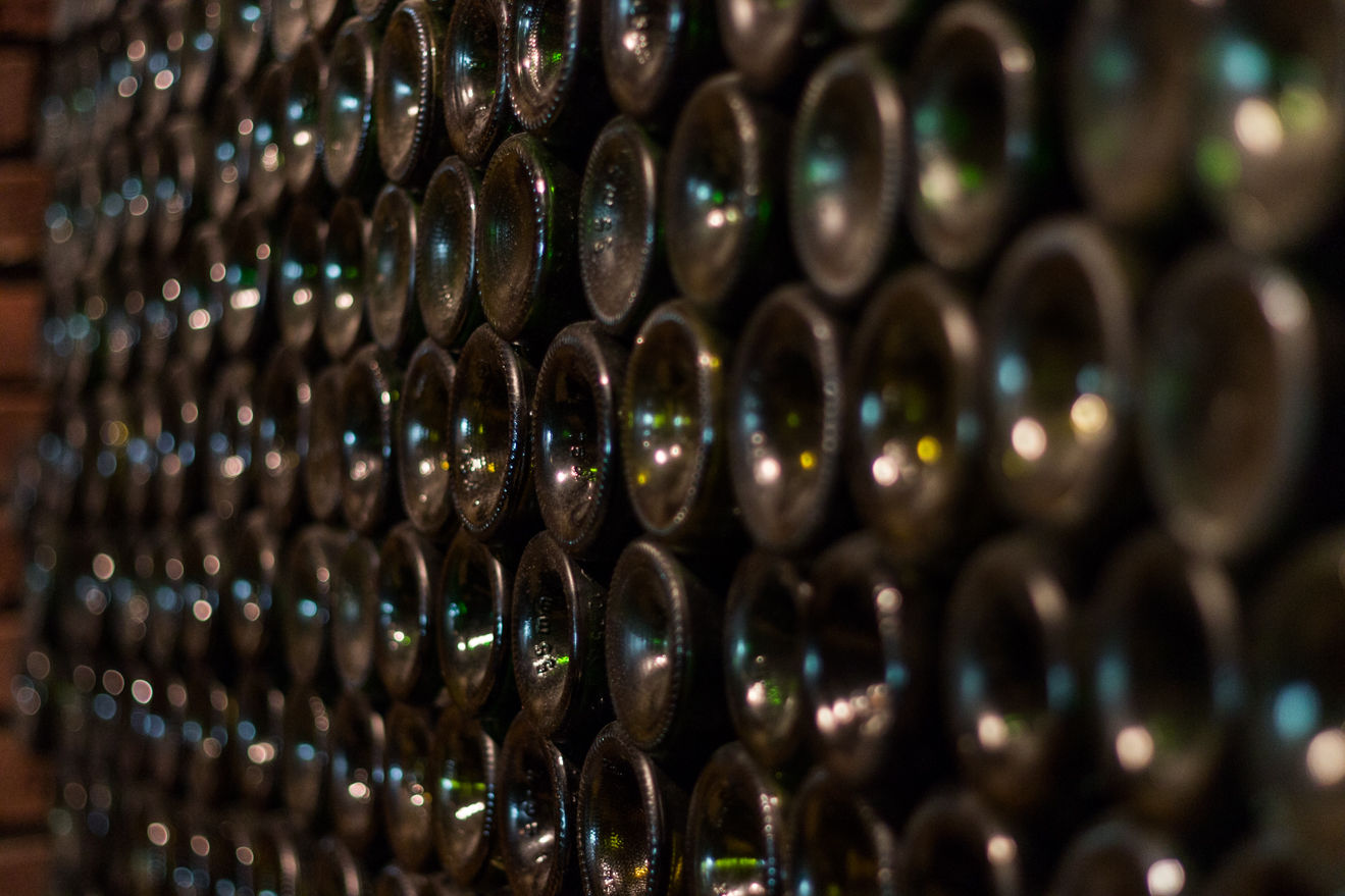 image of wine bottles neatly stacked